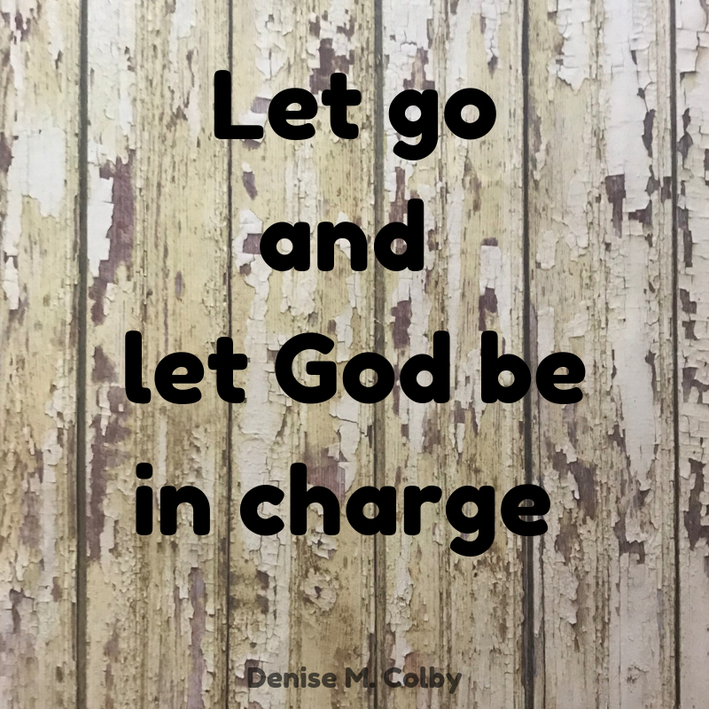 Let go and let God be in charge, quote by Denise M. Colby with old wooden fence background
