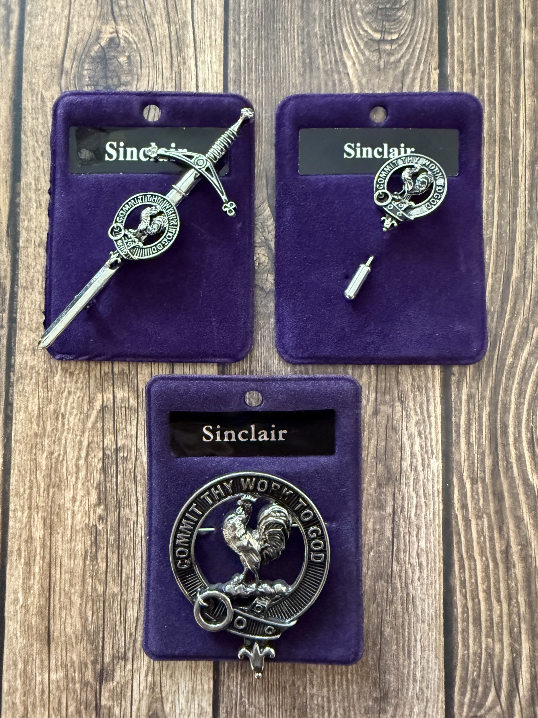 The Sinclair Scottish Hero Crest, which fits perfectly in line with Denise M. Colby's best-laid plans series